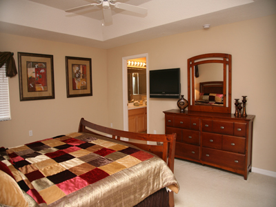 Photograph of the large and luxurious master bedroom and en-site bathroom